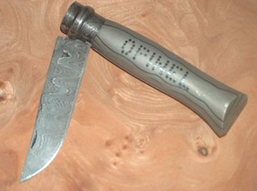 Autre variante pour le manche avec une inscription en fil inox