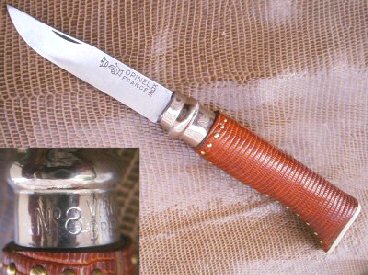 N°8 recouvert de lézard, talon en corne blanche avec monogramme