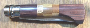 N°9 en palissandre violet et divers autres bois. Talon hexagonal